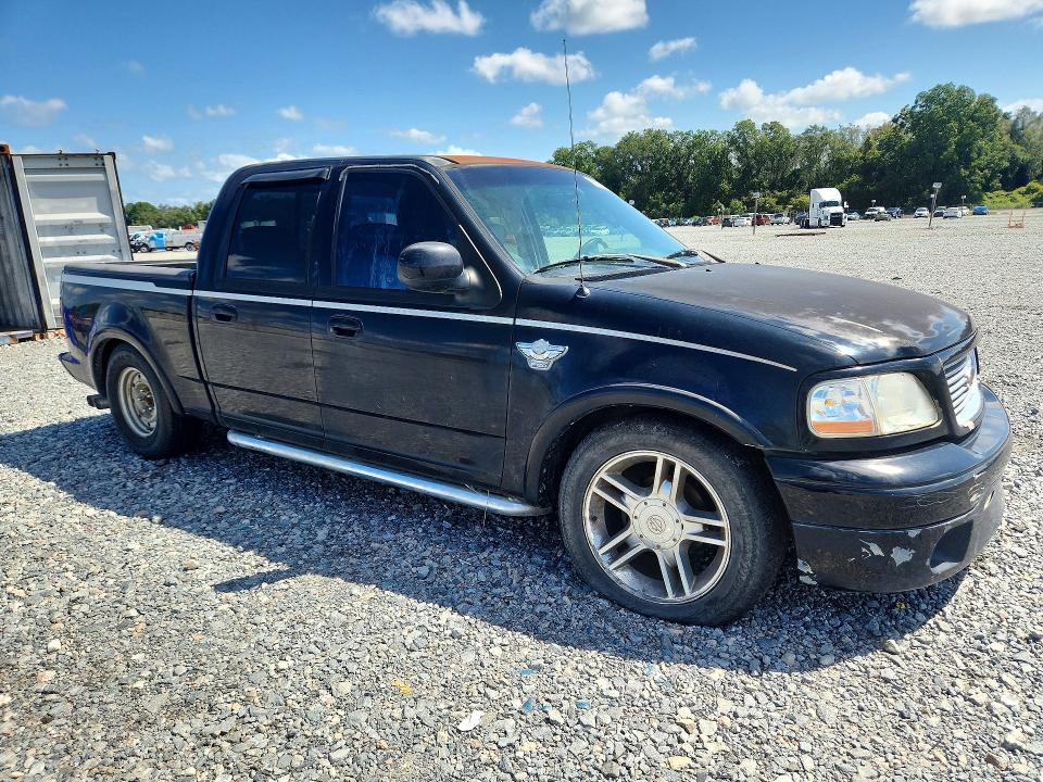 Photo 4 from auction – 2003 FORD F150 with VIN 1FTRW07323KB56619