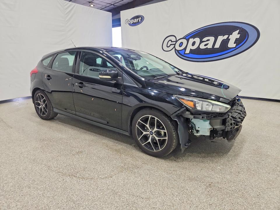 Photo 4 from auction – 2018 FORD FOCUS with VIN 1FADP3M25JL230553