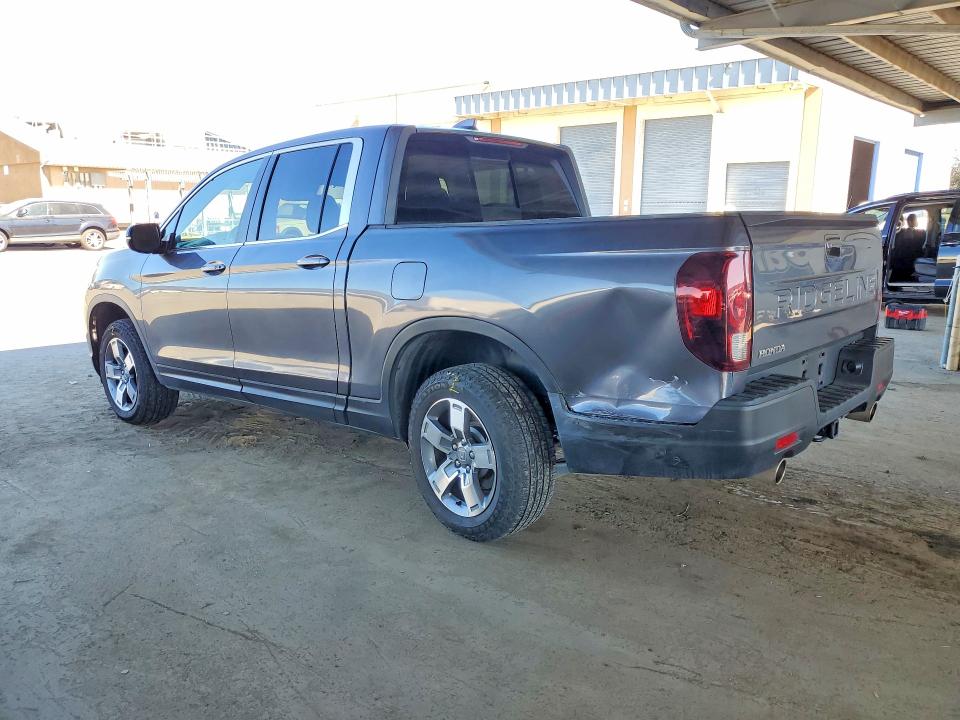 Photo 2 from auction – 2025 HONDA RIDGELINE with VIN 5FPYK3F56SB037633