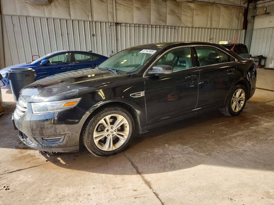 FORD TAURUS 2014 with VIN 1FAHP2H81EG112489 - Photo from auction