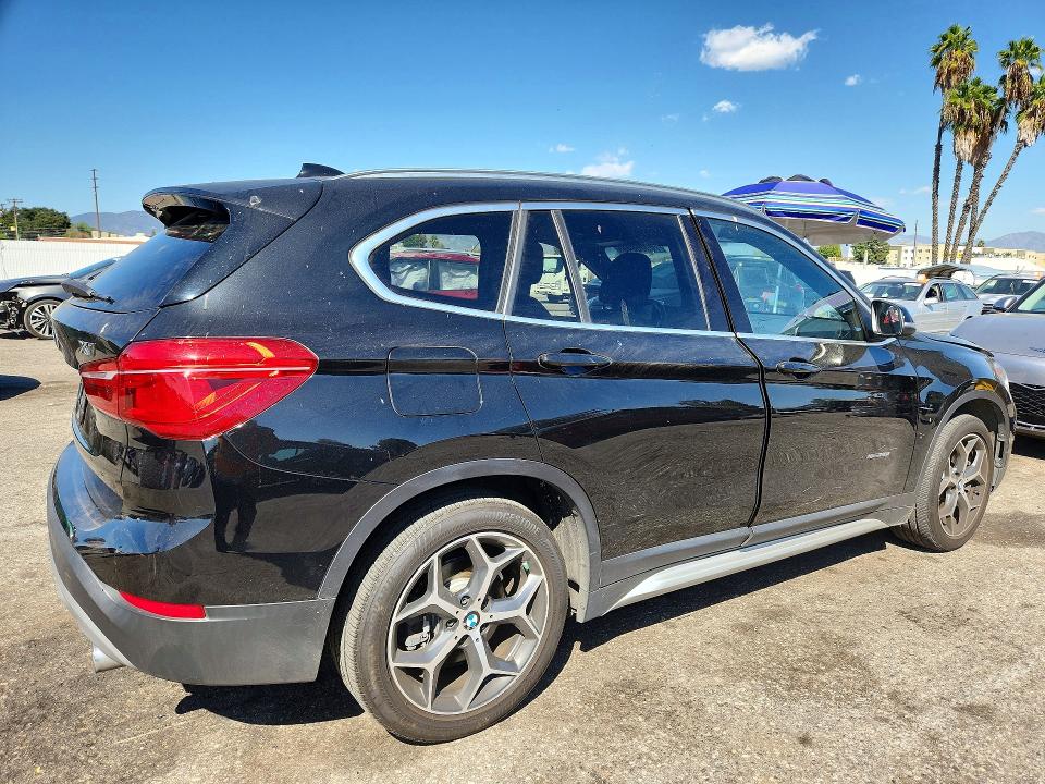 Снимка 3 от търг – 2018 BMW X1 с VIN WBXHT3C31J5K24662