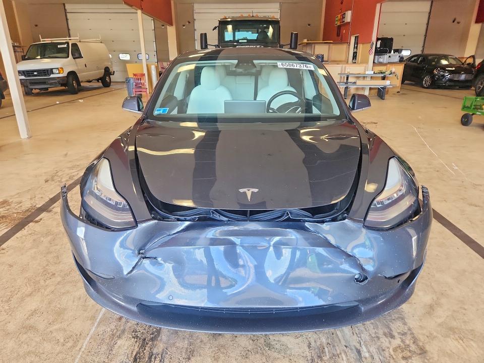 Photo 5 from auction – 2018 TESLA MODEL 3 with VIN 5YJ3E1EB2JF184410