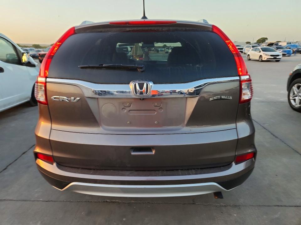 Снимка 6 от търг – 2016 HONDA CR-V с VIN 2HKRM3H70GH565506