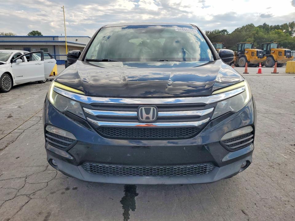 Снимка 5 от търг – 2016 HONDA PILOT с VIN 5FNYF6H60GB089657