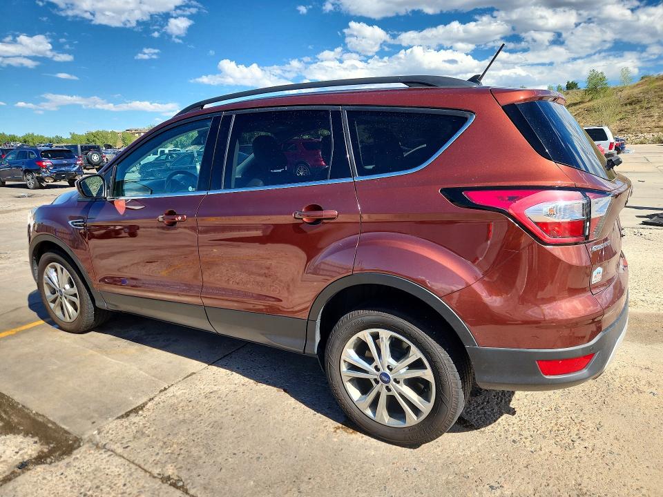 Photo 2 from auction – 2018 FORD ESCAPE with VIN 1FMCU9HD8JUA64290