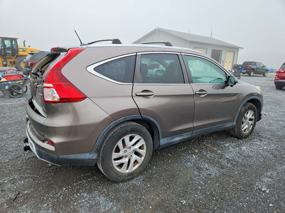 Photo 3 from auction – 2015 HONDA CR-V with VIN 2HKRM4H73FH633530