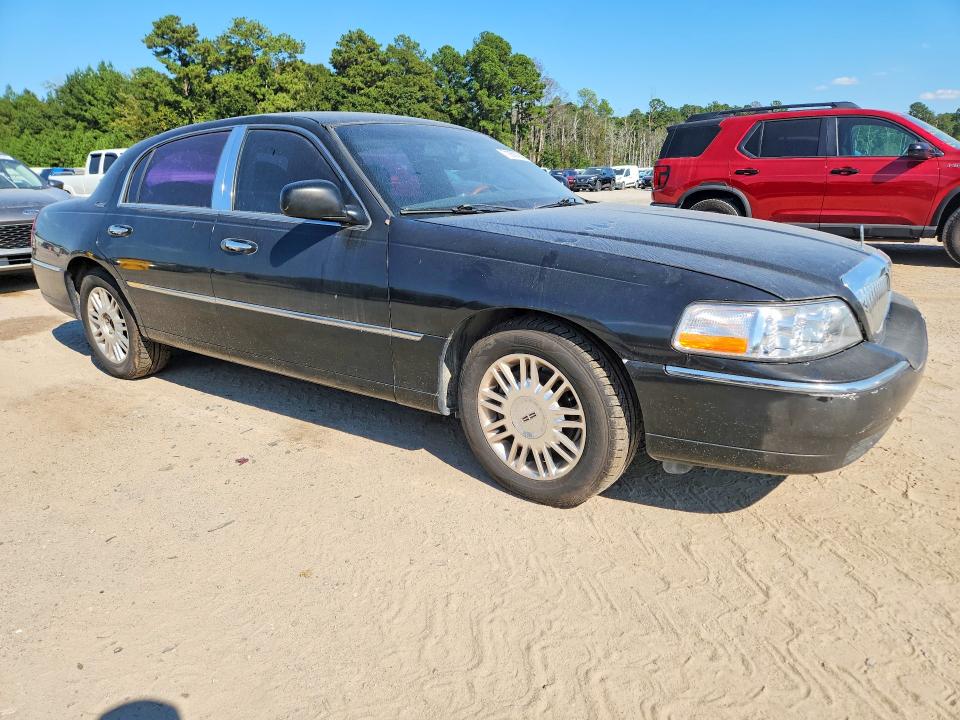 Photo 4 from auction – 2011 LINCOLN TOWN CAR with VIN 2LNBL8CV5BX761077