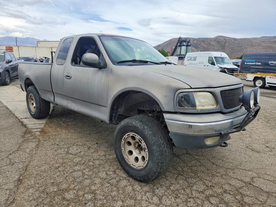 Photo 4 from auction – 2000 FORD F150 with VIN 2FTRX18L8YCA85746