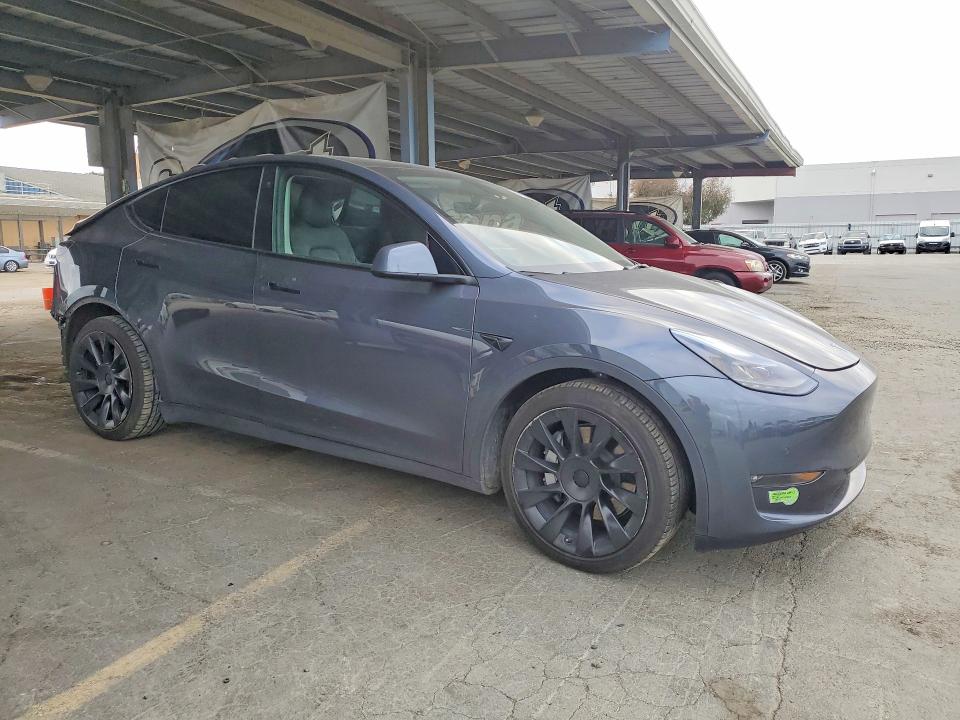 Photo 4 from auction – 2022 TESLA MODEL Y with VIN 7SAYGAEE5NF520554