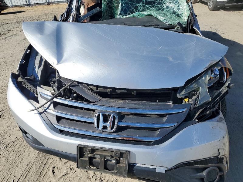 Photo 11 from auction – 2014 HONDA CR-V with VIN 2HKRM4H77EH680901