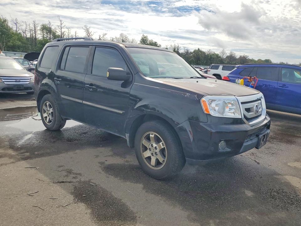 Photo 4 from auction – 2011 HONDA PILOT with VIN 5FNYF4H9XBB050422