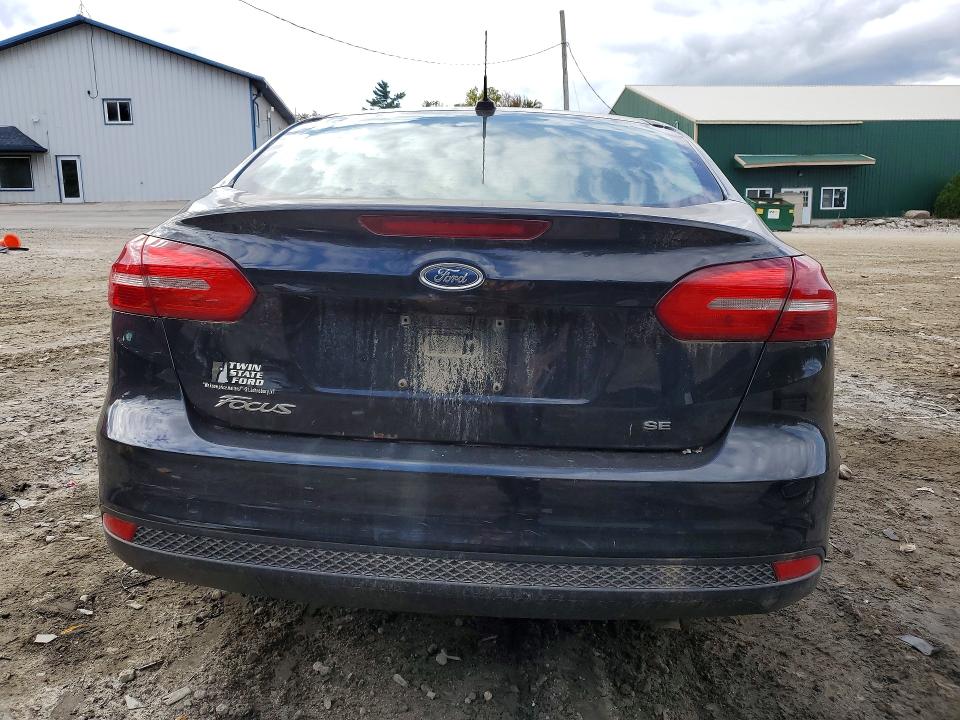 Foto 6 de la subasta – 2018 FORD FOCUS con VIN 1FADP3F27JL306545
