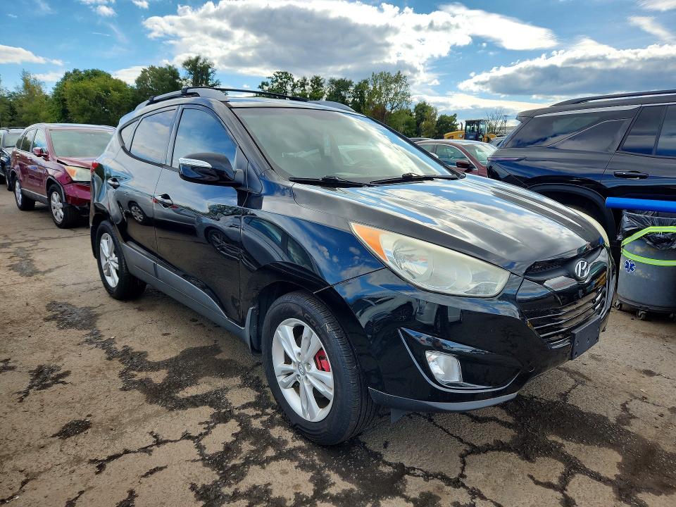 Zdjęcie 4 z aukcji – 2013 HYUNDAI TUCSON z VIN KM8JUCAC2DU643561