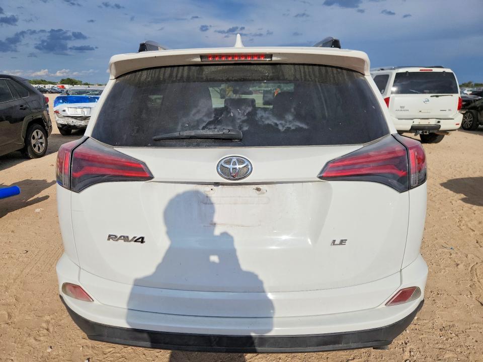 Photo 6 from auction – 2018 TOYOTA RAV4 with VIN JTMZFREV5JJ210278