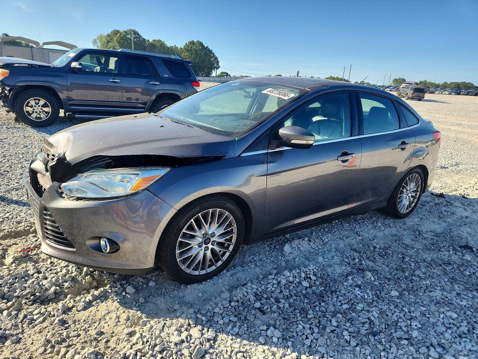 FORD FOCUS 2014 مع رقم تعريف المركبة 1FADP3J20EL338931 - صورة من المزاد