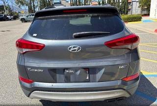Photo 11 from auction – 2017 HYUNDAI TUCSON with VIN KM8J33A21HU506501