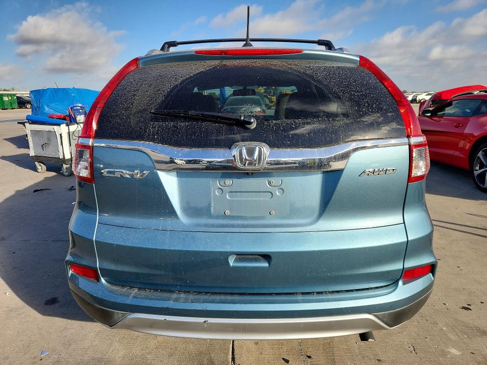 Photo 6 from auction – 2016 HONDA CR-V with VIN 2HKRM4H79GH668008