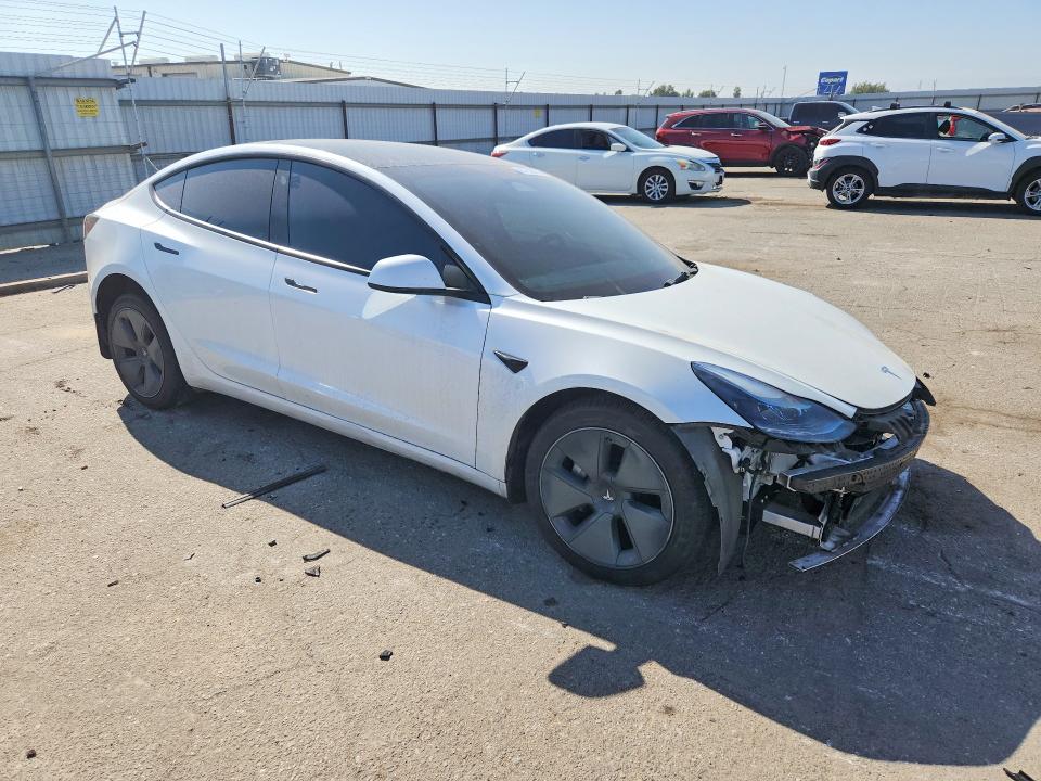 Foto 4 de la subasta – 2022 TESLA MODEL 3 con VIN 5YJ3E1EB4NF132086