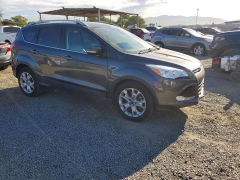 Photo 4 from auction – 2015 FORD ESCAPE with VIN 1FMCU0J96FUC12896