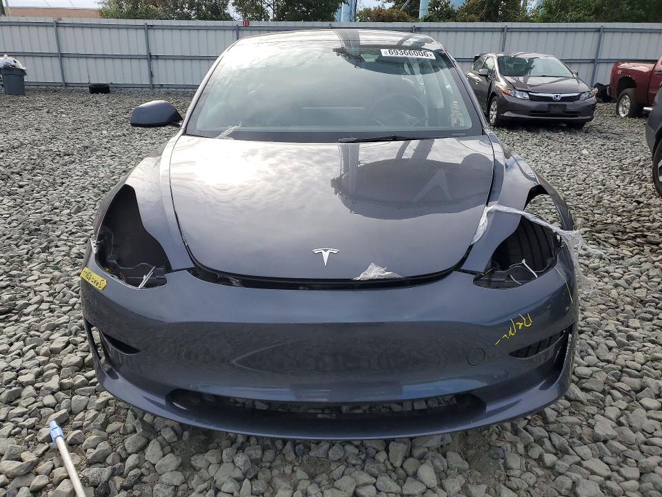 Снимка 5 от търг – 2023 TESLA MODEL 3 с VIN 5YJ3E1EA6PF674302