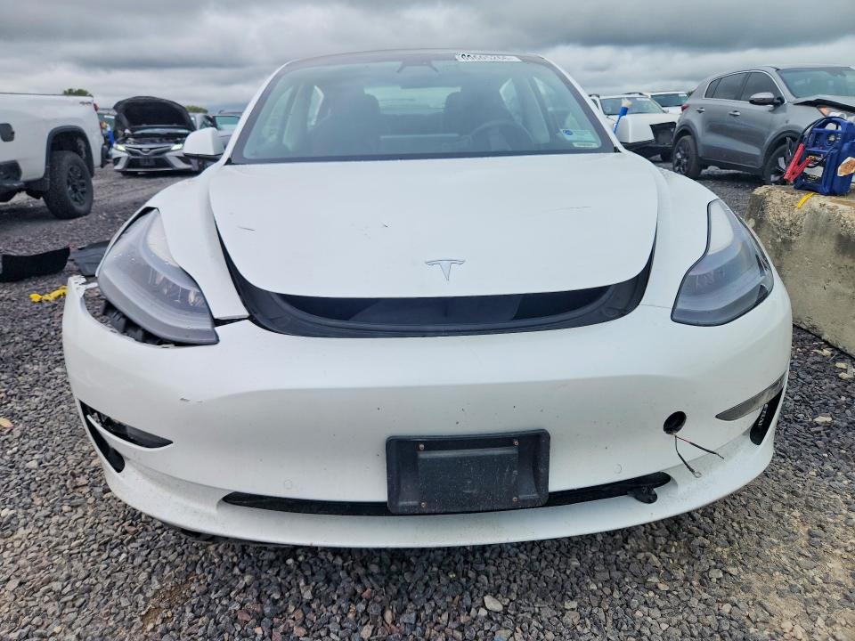 Снимка 5 от търг – 2021 TESLA MODEL 3 с VIN 5YJ3E1EA9MF013620