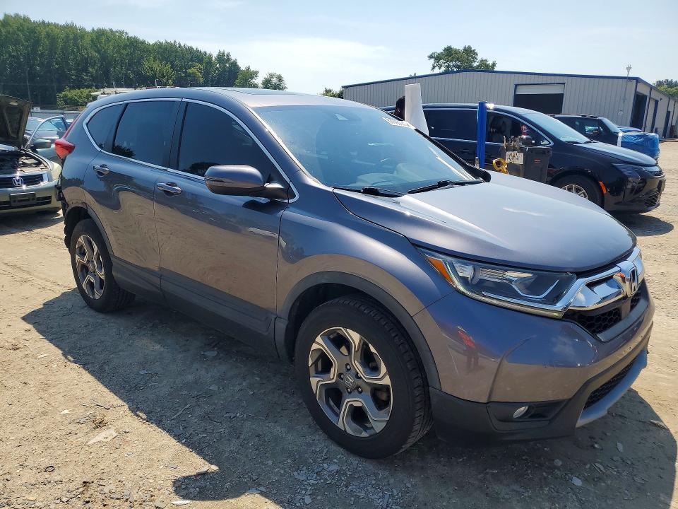 Photo 4 from auction – 2017 HONDA CR-V with VIN 5J6RW2H81HL034593