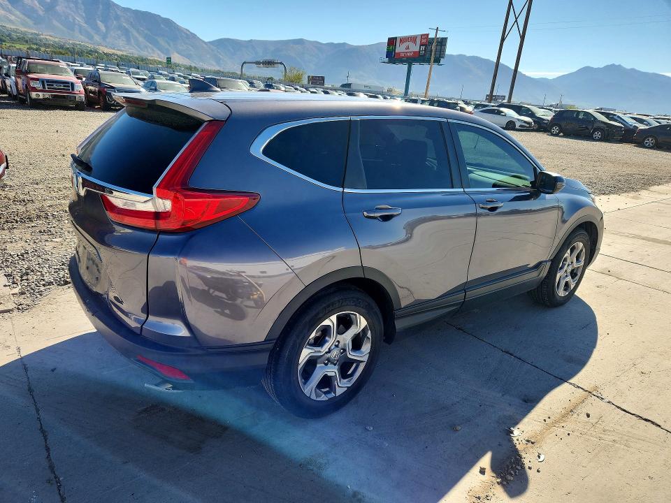 Photo 3 from auction – 2017 HONDA CR-V with VIN 7FARW1H85HE046589