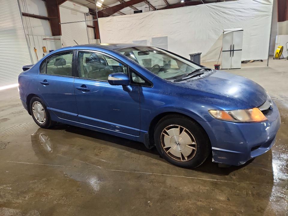 Снимка 4 от търг – 2010 HONDA CIVIC с VIN JHMFA3F26AS007623