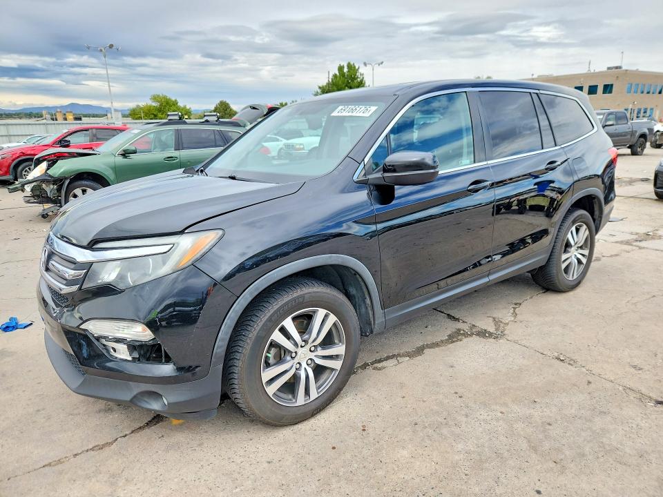 HONDA PILOT 2018 with VIN 5FNYF6H56JB038338 - Photo from auction