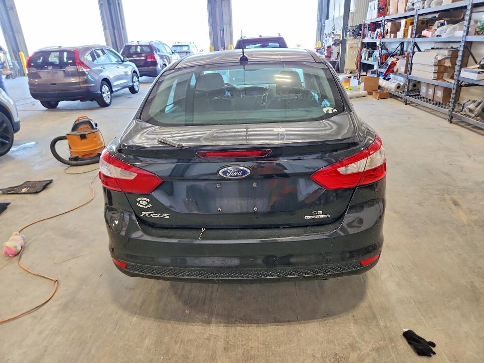 Photo 6 from auction – 2014 FORD FOCUS with VIN 1FADP3F29EL131320