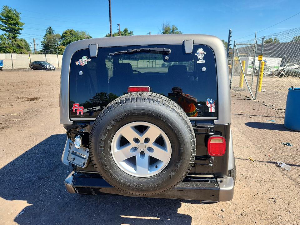 Photo 6 from auction – 1998 JEEP WRANGLER SW with VIN 1J4FY19S8WP798450