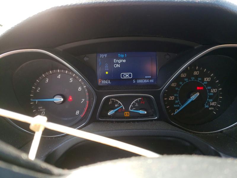 Photo 9 from auction – 2014 FORD FOCUS with VIN 1FADP3K25EL271516
