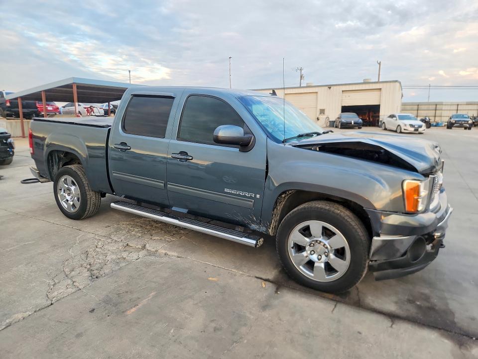 Foto 4 de la subasta – 2009 GMC SIERRA con VIN 3GTEC23J29G105385