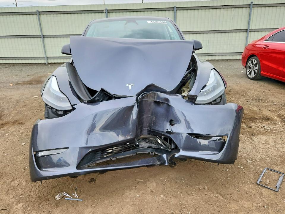 Фото 5 с аукциона – 2023 TESLA MODEL Y с VIN 7SAYGAEE7PF843796