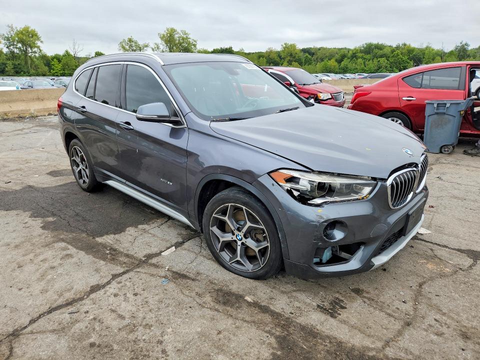 Photo 4 from auction – 2016 BMW X1 with VIN WBXHT3Z35G4A51169