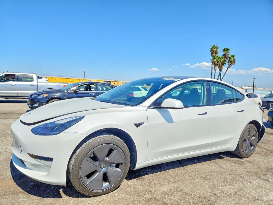 TESLA MODEL 3 2023 with VIN 5YJ3E1EA2PF612041 - Photo from auction