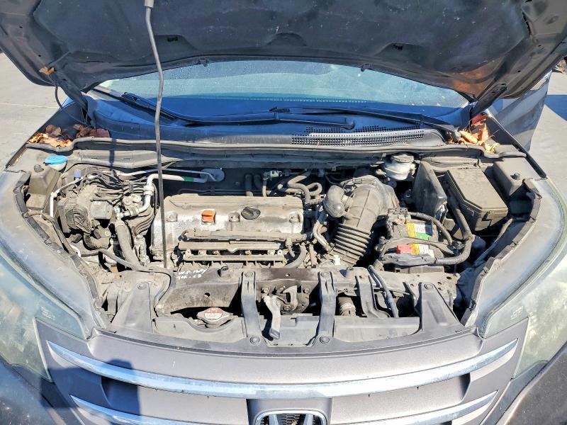 Photo 12 from auction – 2014 HONDA CR-V with VIN 2HKRM3H35EH564944