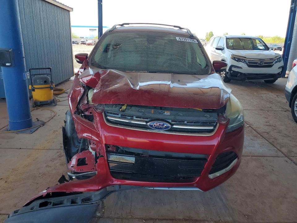 Photo 5 from auction – 2014 FORD ESCAPE with VIN 1FMCU0J94EUA39023
