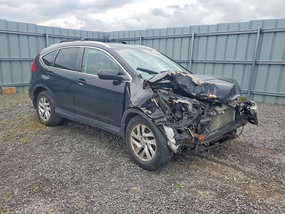 Photo 4 from auction – 2016 HONDA CR-V with VIN 2HKRM4H43GH103372