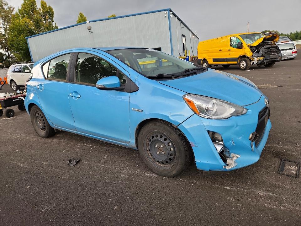 Photo 4 from auction – 2015 TOYOTA PRIUS C with VIN JTDKDTB37F1089722