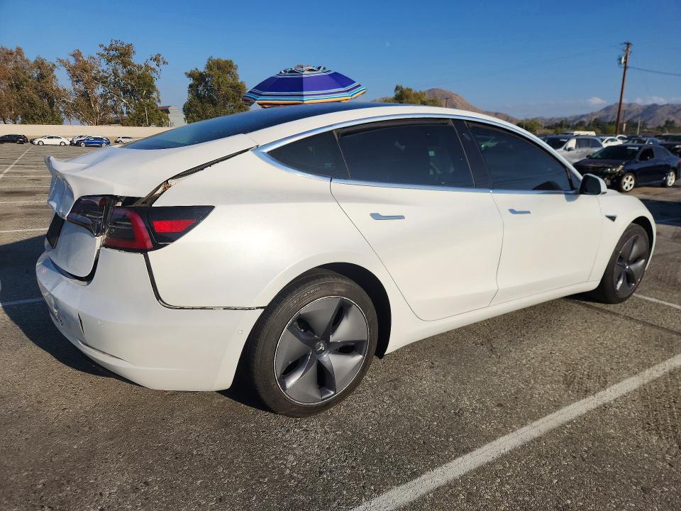 Снимка 3 от търг – 2019 TESLA MODEL 3 с VIN 5YJ3E1EA1KF483721