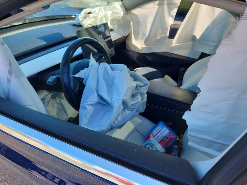 Снимка 7 от търг – 2018 TESLA MODEL 3 с VIN 5YJ3E1EB7JF096470