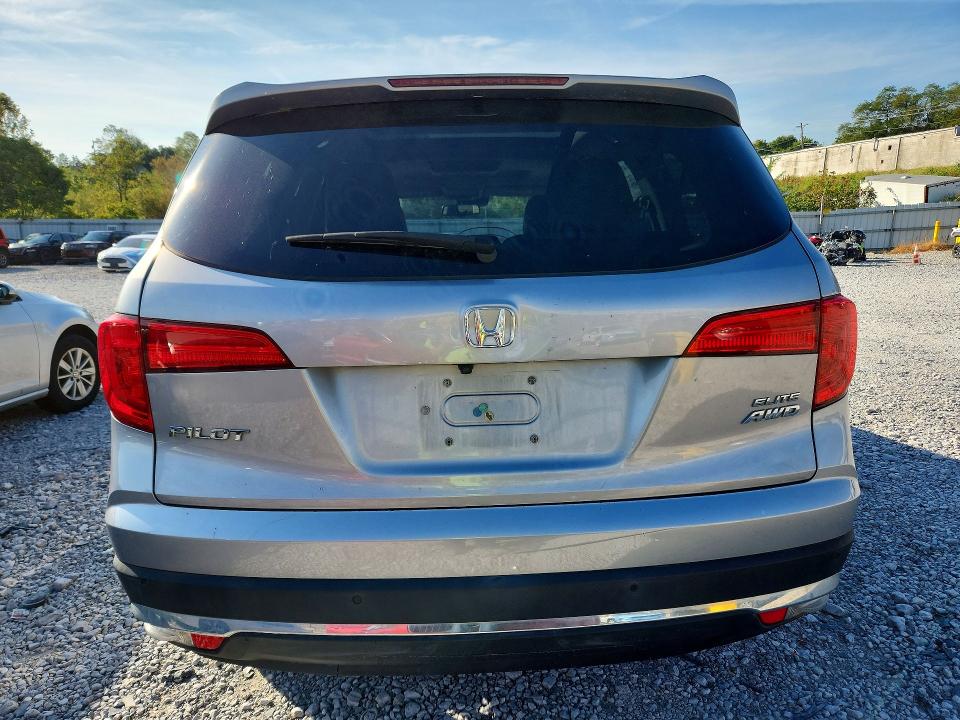 Photo 6 from auction – 2016 HONDA PILOT with VIN 5FNYF6H03GB122968