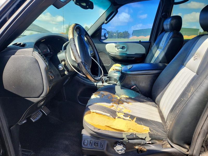 Photo 7 from auction – 2003 FORD F150 with VIN 1FTRW07323KB56619