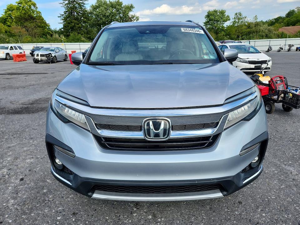 Photo 5 from auction – 2021 HONDA PILOT with VIN 5FNYF6H90MB048564
