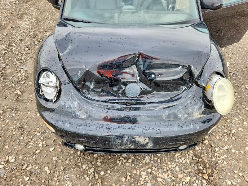 Снимка 11 от търг – 2000 VOLKSWAGEN NEW BEETLE с VIN 3VWDD21C5YM493111