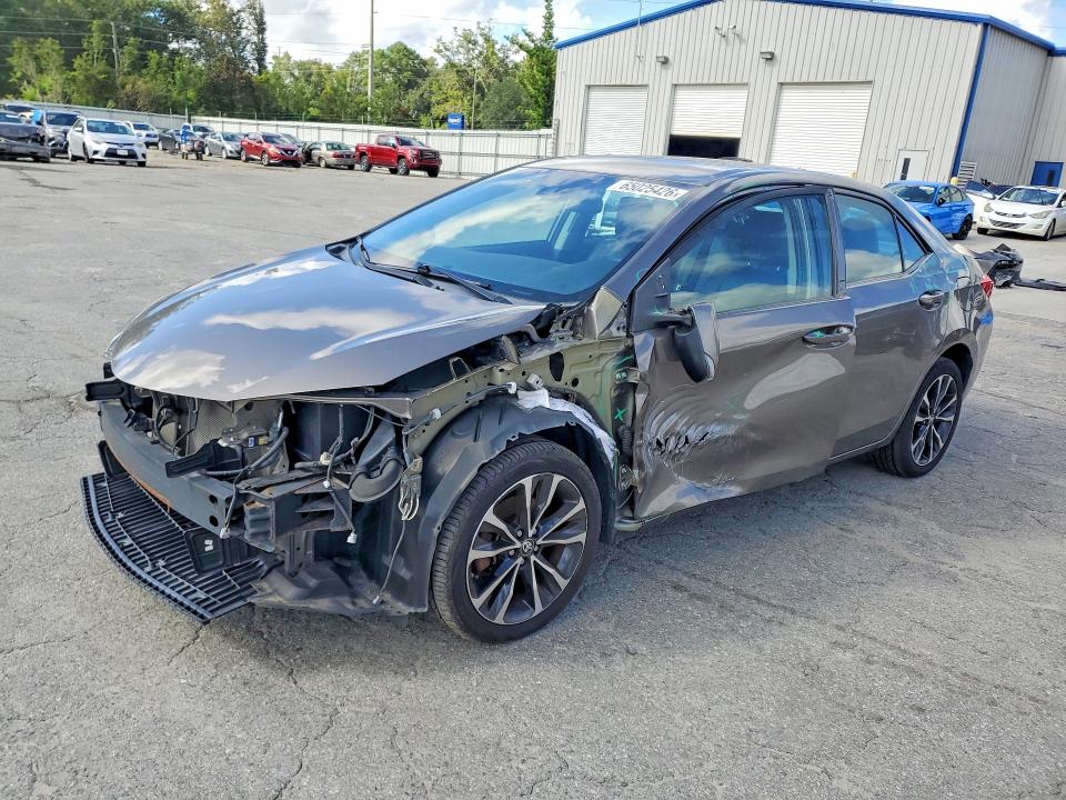 TOYOTA COROLLA 2017 with VIN 2T1BURHE9HC753383 - Photo from auction