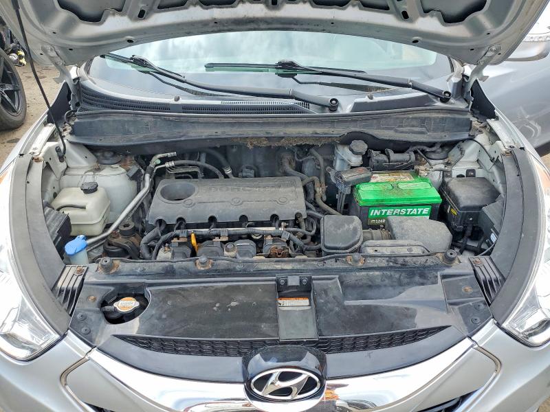 Photo 12 from auction – 2010 HYUNDAI TUCSON with VIN KM8JUCAC3AU024883