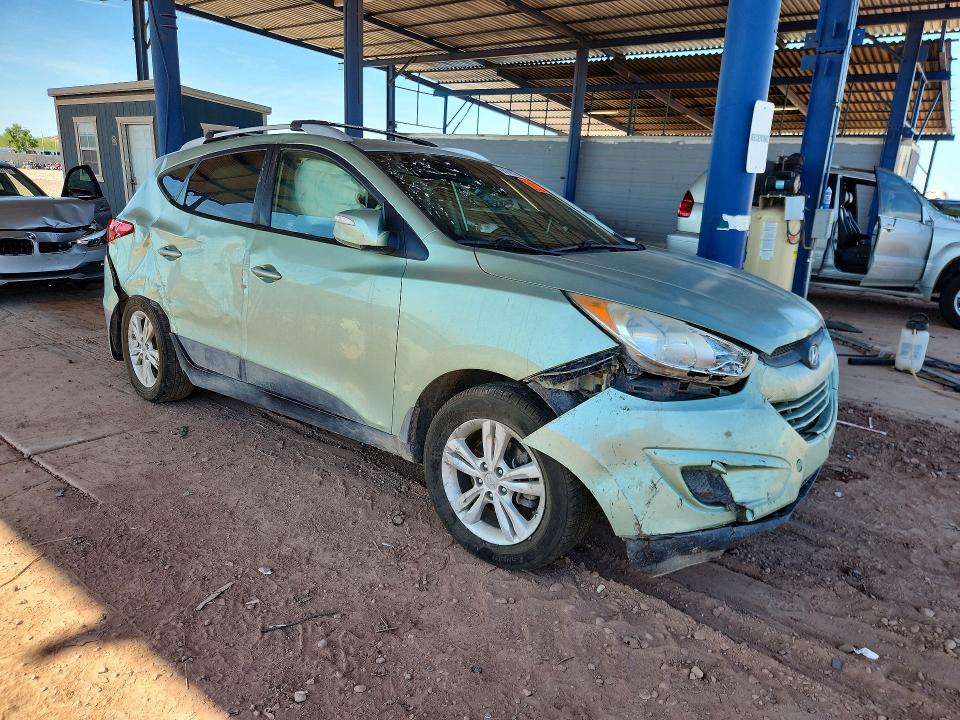 Photo 4 from auction – 2012 HYUNDAI TUCSON with VIN KM8JUCAC9CU351467