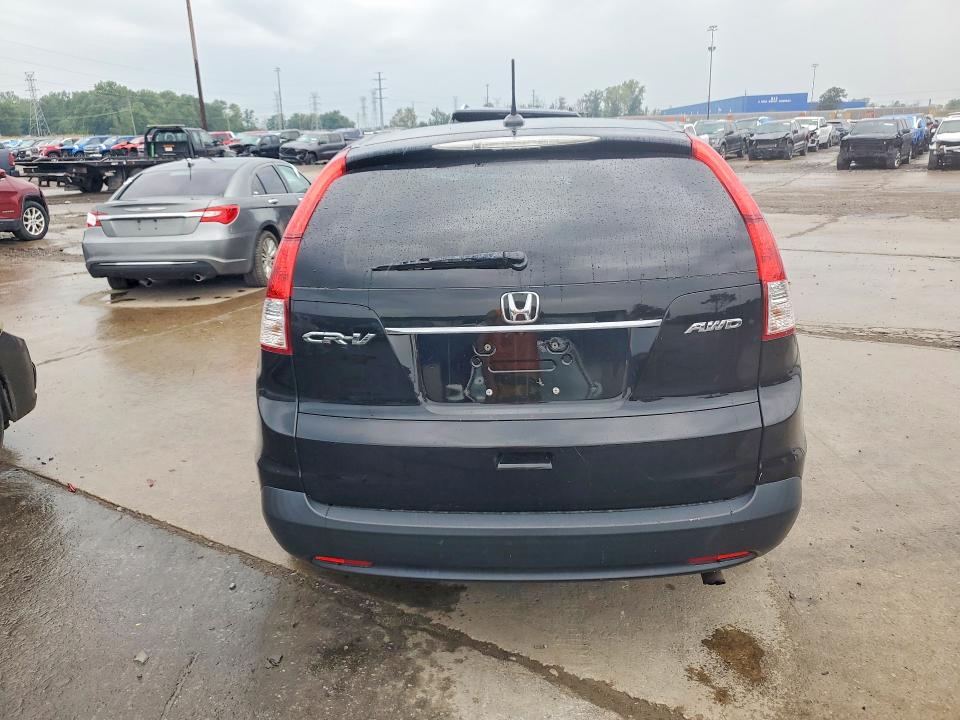 Photo 6 from auction – 2012 HONDA CR-V with VIN 2HKRM4H75CH100087
